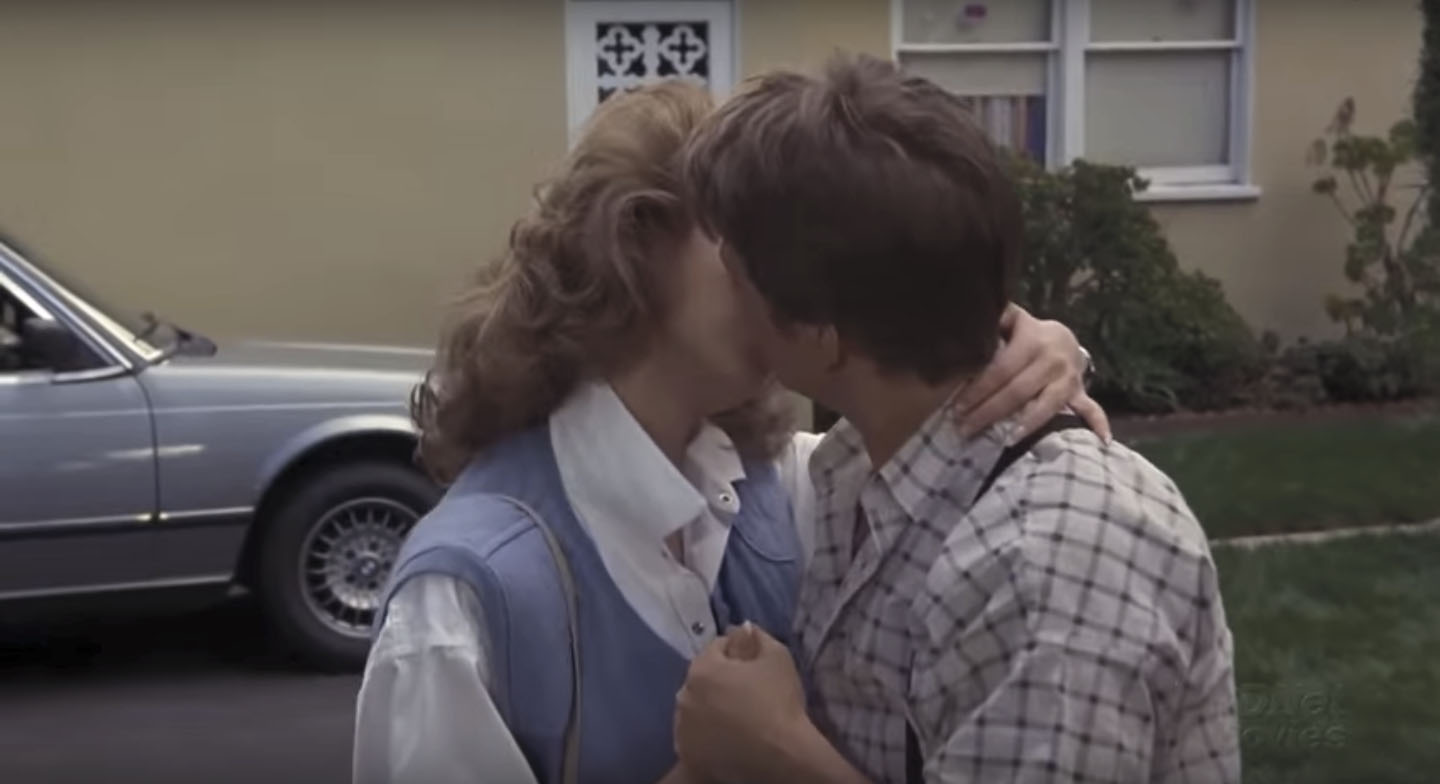 Marty kisses his girlfriend